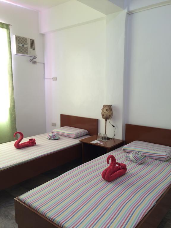 Brielles Travellers Inn Тагбиларан Сити Екстериор снимка